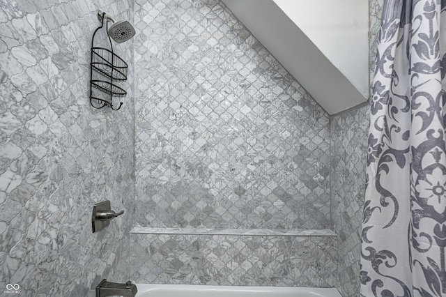 room details with shower / tub combo with curtain