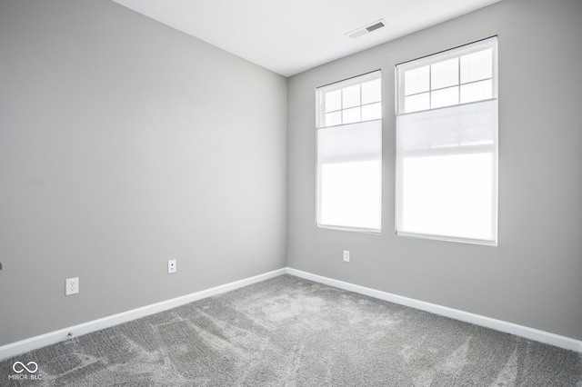 view of carpeted spare room