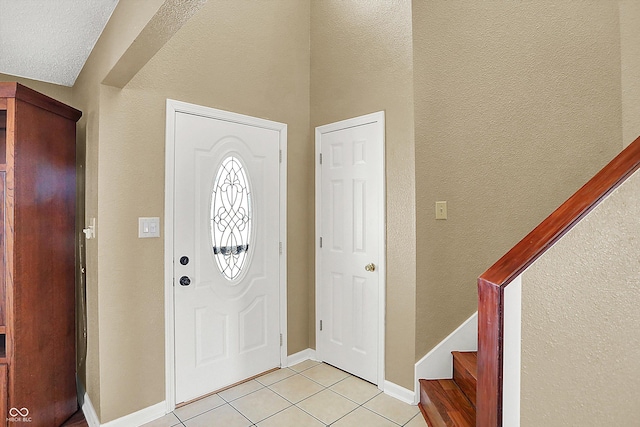 view of tiled entrance foyer