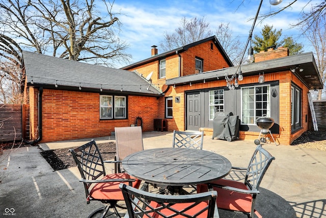 rear view of house featuring a patio