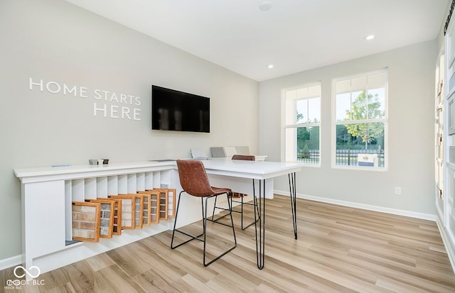 office space featuring light wood-type flooring