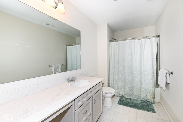 full bath with visible vents, toilet, vanity, and baseboards