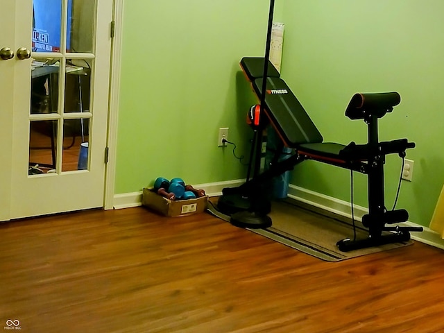 exercise area featuring hardwood / wood-style floors