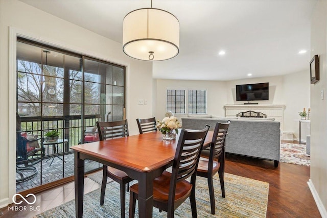 dining space featuring dark hardwood / wood-style floors