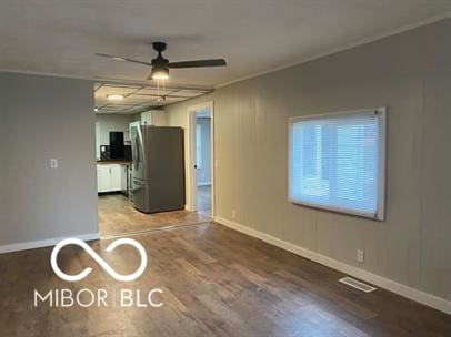 interior space featuring hardwood / wood-style flooring and ceiling fan