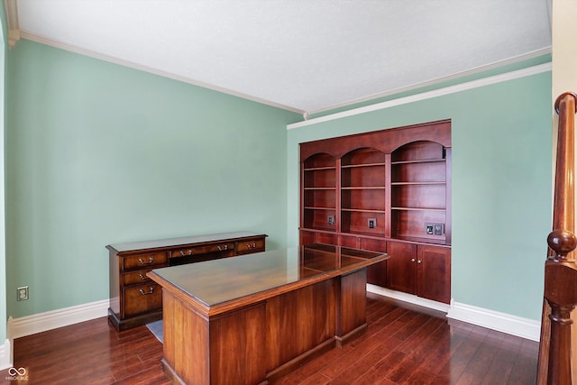 unfurnished office featuring ornamental molding and dark wood-type flooring