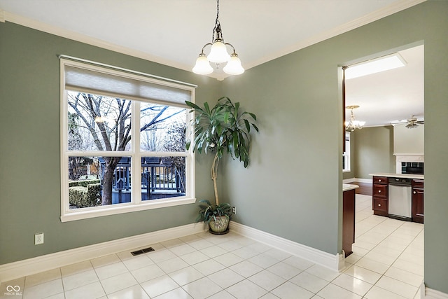 unfurnished dining area with crown molding, ceiling fan with notable chandelier, and light tile patterned floors