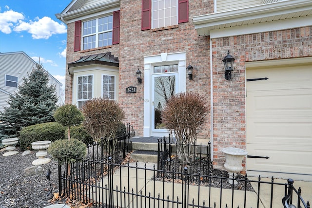 property entrance with a garage