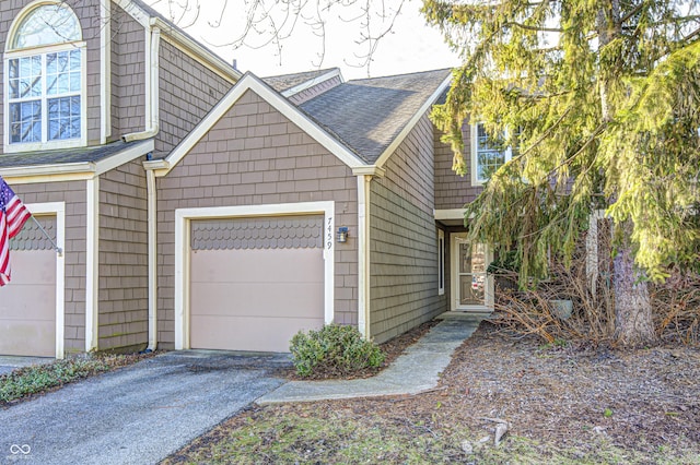 exterior space with a garage