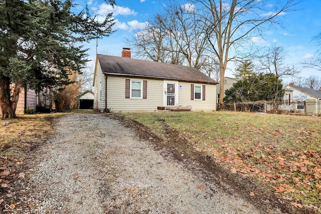 view of front of home with a front yard