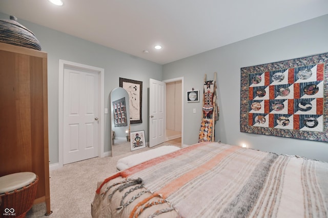 bedroom with light colored carpet