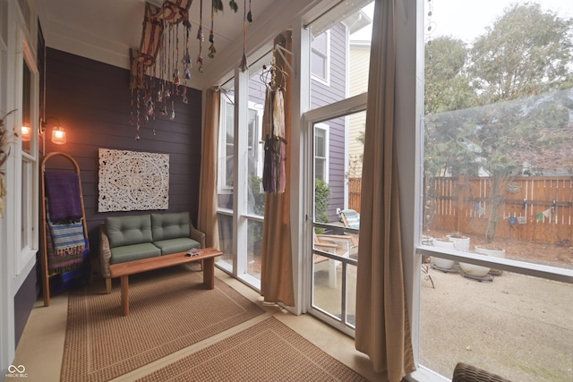 doorway to outside featuring wooden walls