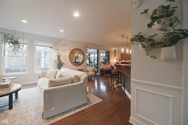 living room with dark hardwood / wood-style floors