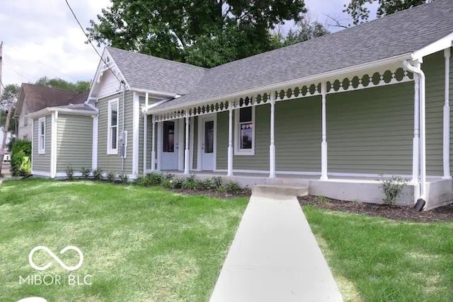 view of front of property with a front lawn and a porch