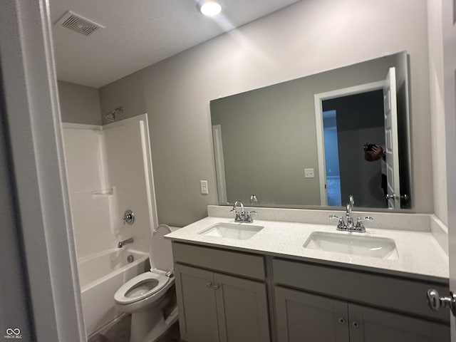 full bathroom with vanity, toilet, and shower / bath combination