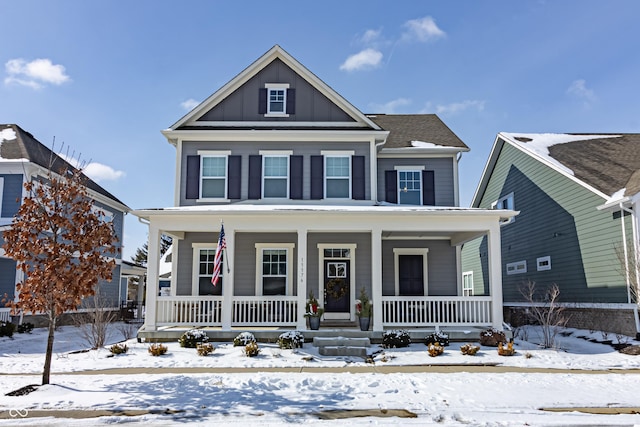 view of front of property with board and batten siding and covered porch