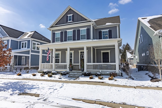 view of front facade featuring board and batten siding and a porch