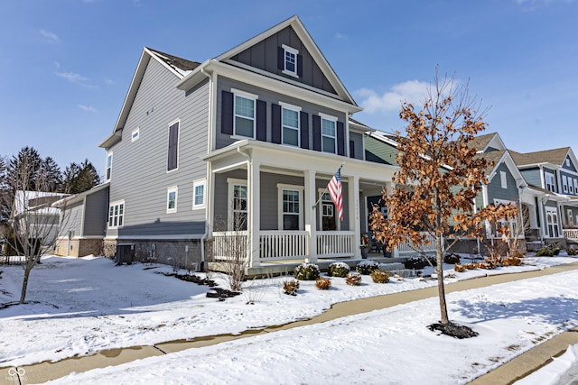 view of front of home with board and batten siding and a porch