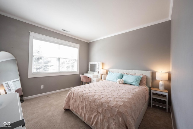 bedroom featuring crown molding and carpet floors