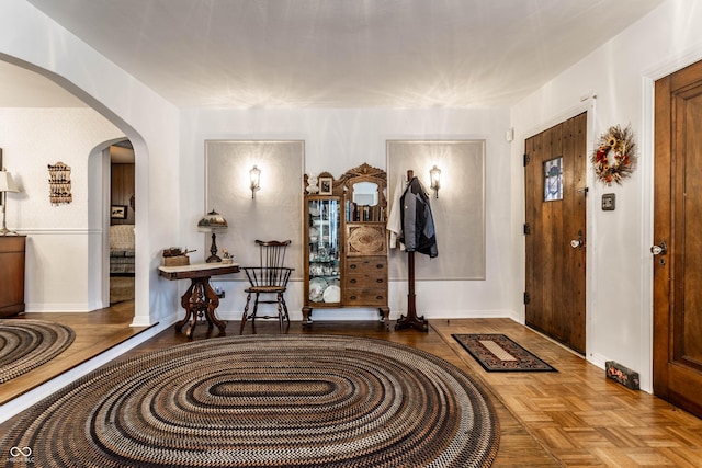 entrance foyer with parquet flooring