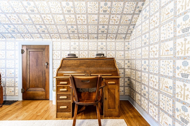 office area with wood-type flooring