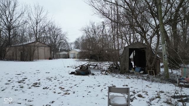 view of yard layered in snow