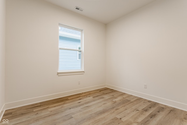 unfurnished room featuring light hardwood / wood-style flooring