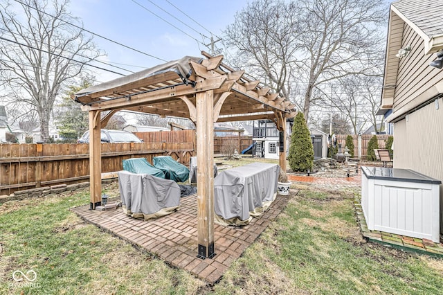 view of yard with a playground and a storage unit