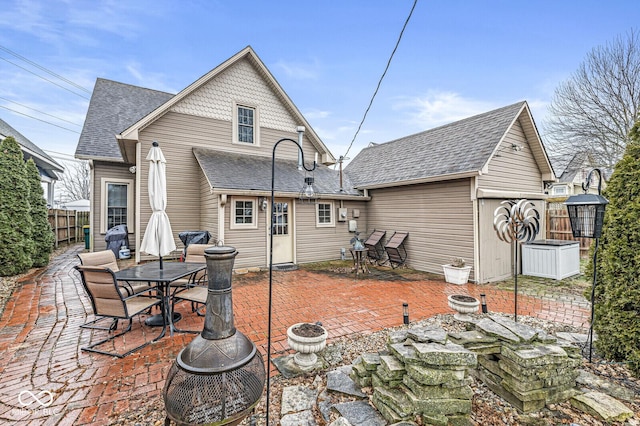 rear view of house featuring a patio