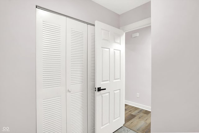 hallway featuring light wood-type flooring