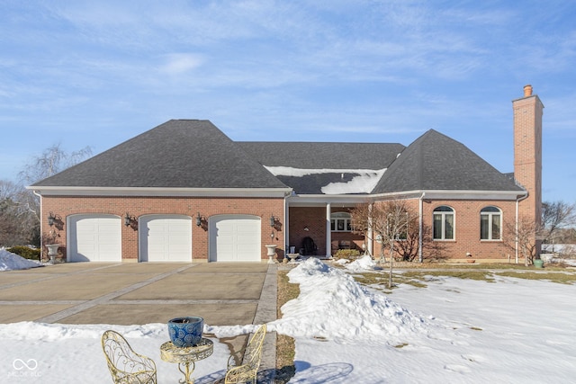 view of front of property featuring a garage