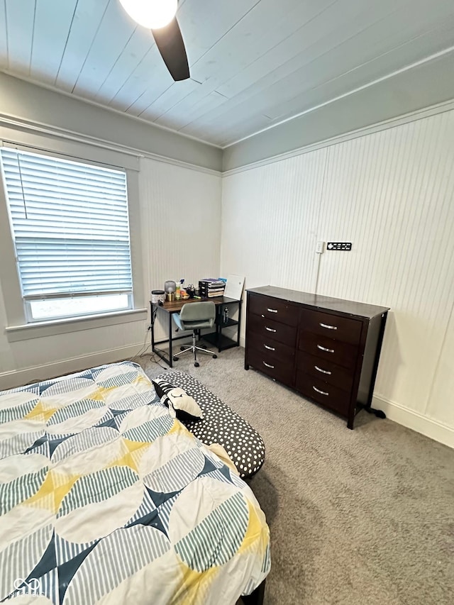 bedroom with ceiling fan and light carpet