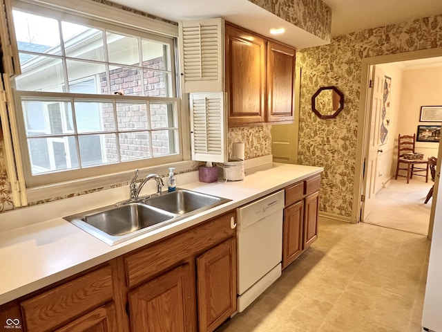 kitchen featuring sink and dishwasher