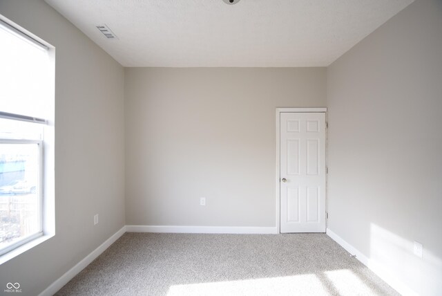 10 N Keystone Ave, Indianapolis, IN 46201 - unfurnished room featuring carpet flooring