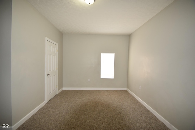 10 N Keystone Ave, Indianapolis, IN 46201 - carpeted spare room with a textured ceiling