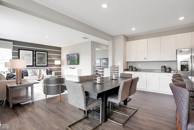 dining room featuring dark hardwood / wood-style flooring