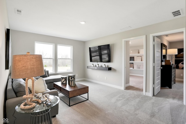 living room with light carpet