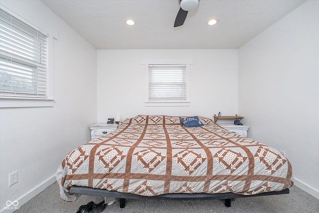 carpeted bedroom featuring ceiling fan