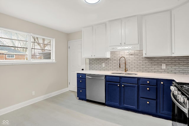 kitchen featuring blue cabinets, sink, tasteful backsplash, stainless steel appliances, and white cabinets