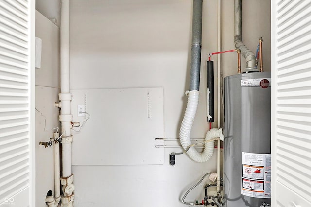 utility room with water heater