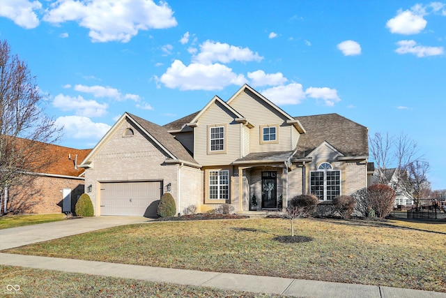 view of front facade with a garage and a front lawn