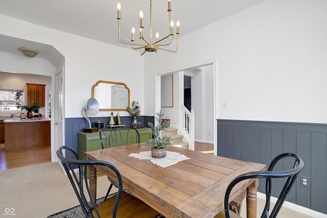 dining space featuring a notable chandelier