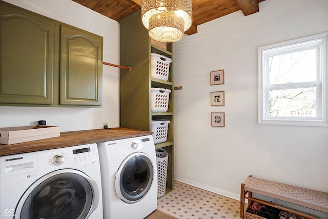 laundry area with separate washer and dryer, wooden ceiling, cabinets, and a chandelier