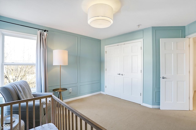 carpeted bedroom featuring a closet