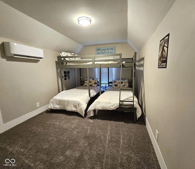 bedroom featuring dark colored carpet, vaulted ceiling, and a wall mounted air conditioner