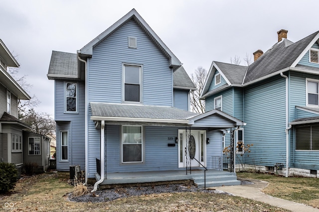 view of property featuring a porch