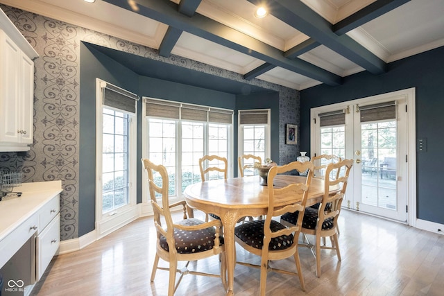 dining space with coffered ceiling, baseboards, french doors, beam ceiling, and wallpapered walls