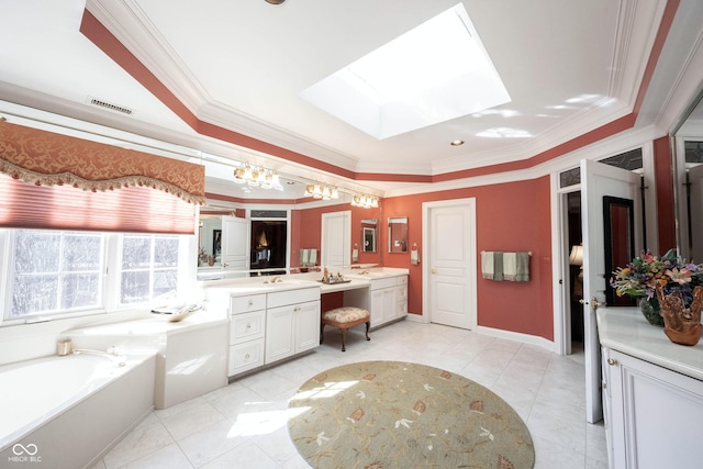 bathroom with visible vents, ornamental molding, a bath, and vanity