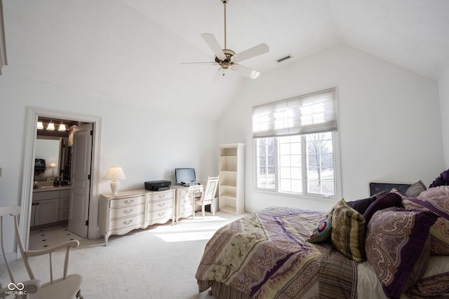 bedroom featuring visible vents, a ceiling fan, light carpet, connected bathroom, and vaulted ceiling