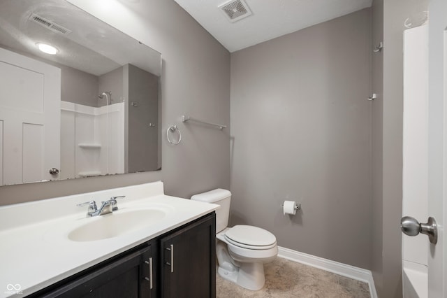 bathroom featuring a shower, visible vents, toilet, and vanity